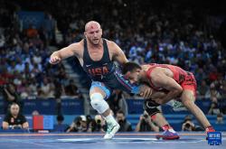 米兰体育官网app-苏丹选手斩获男子94公斤级摔跤铜牌